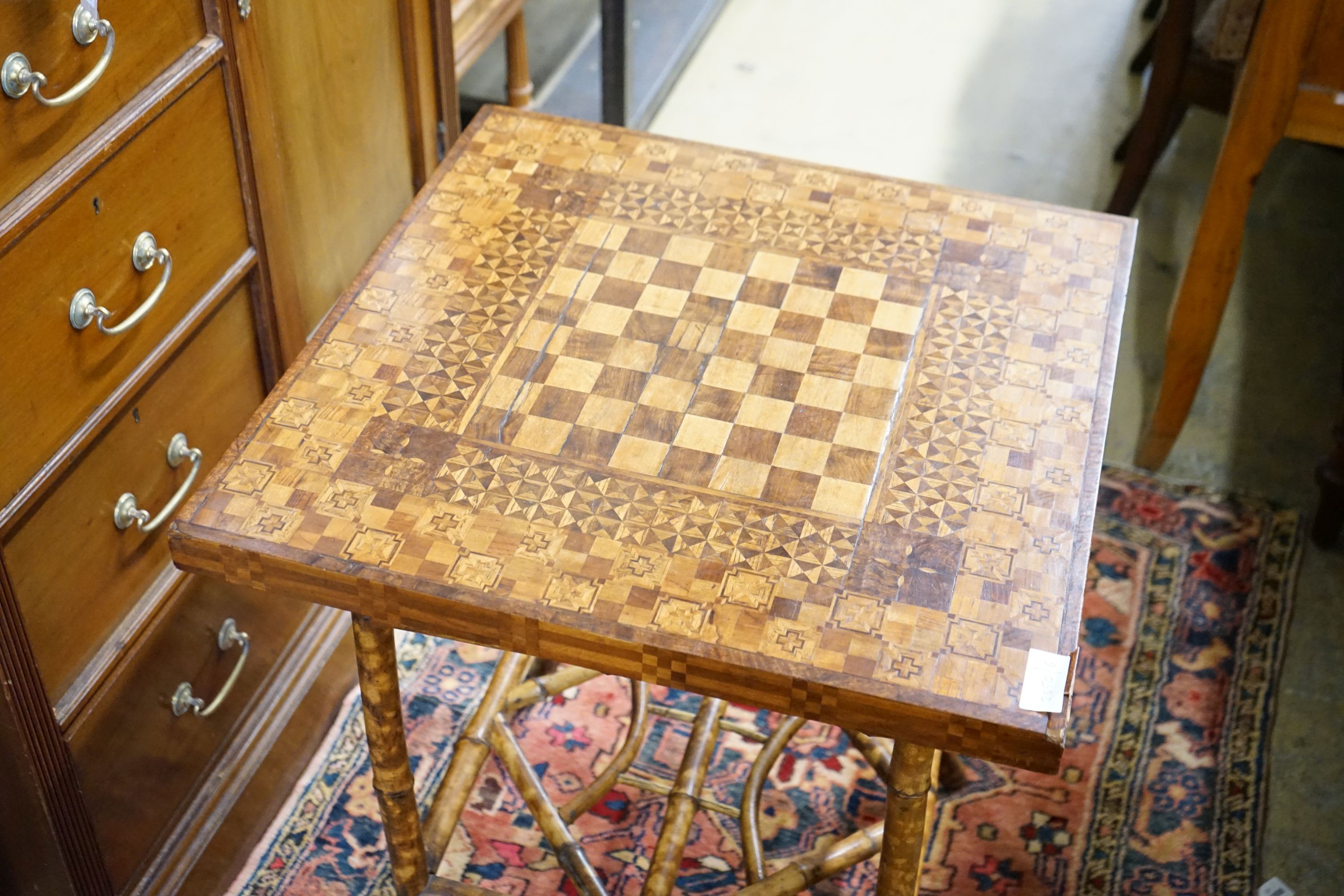 A Victorian bamboo parquetry topped games table, width 59cm, depth 59cm, height 69cm
